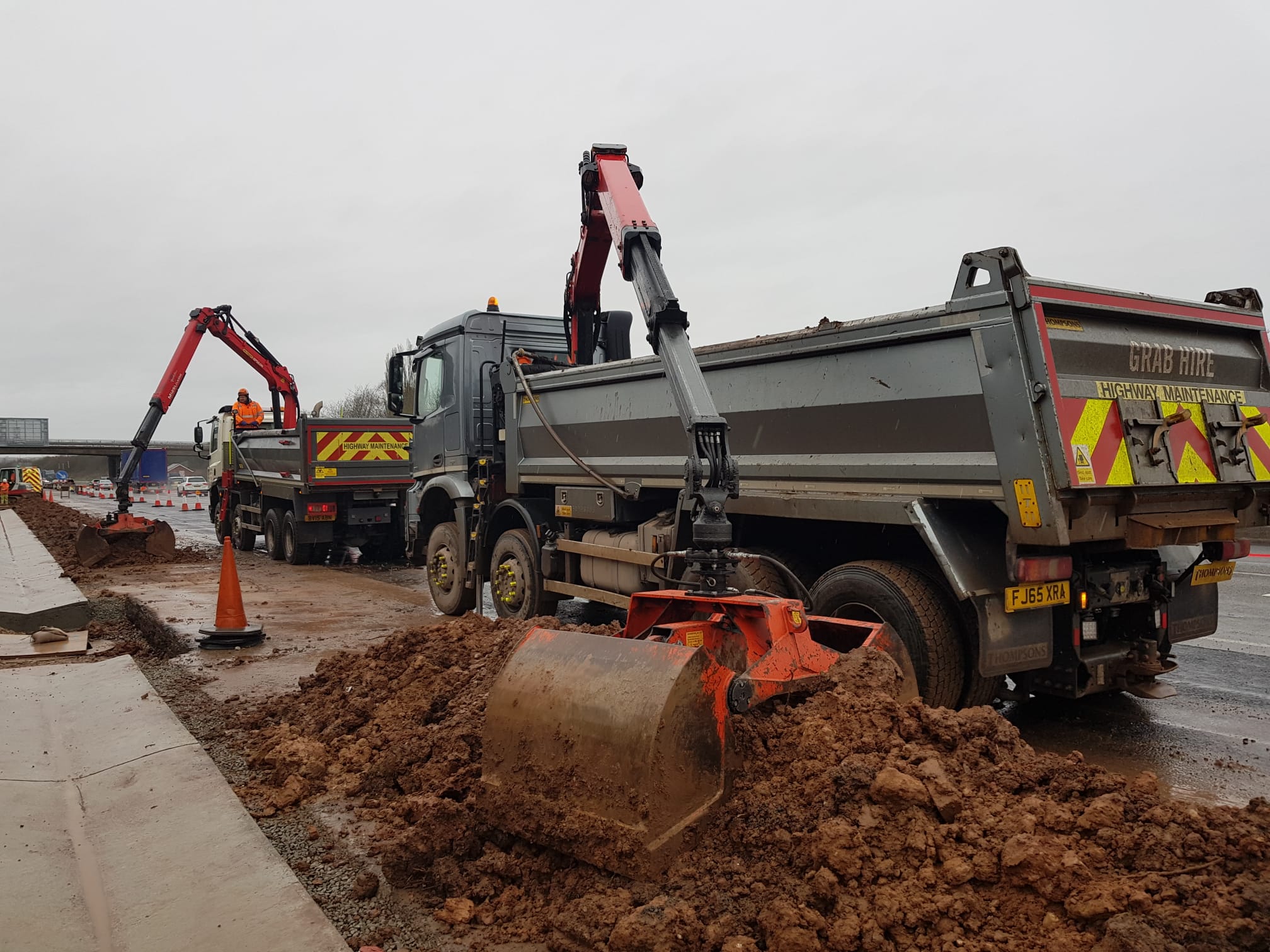 a grab hire truck digging